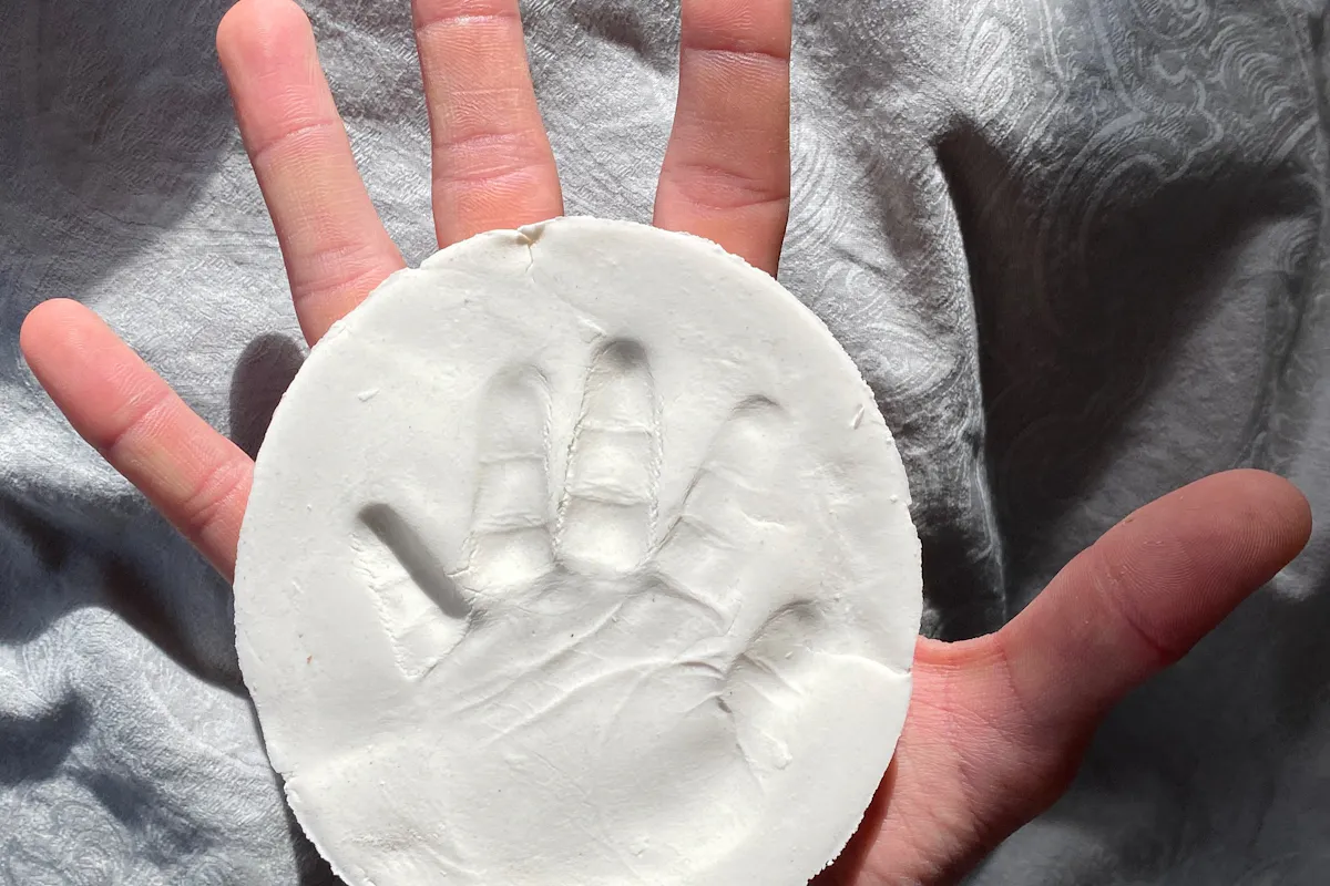 Abdruck von Babyhand und Babyfuss